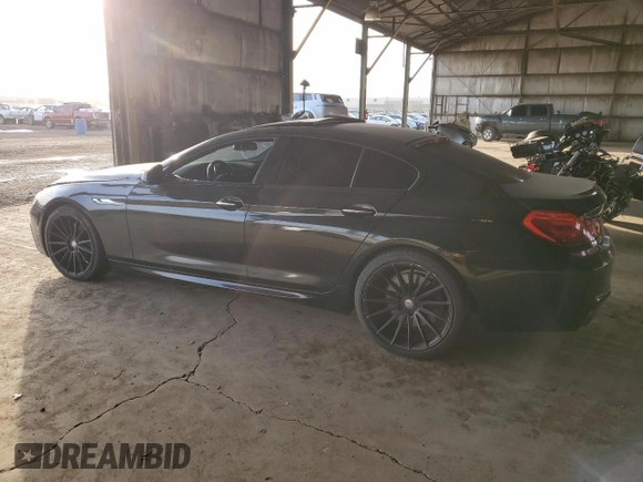 2014 BMW 6 Series 650i with VIN WBA6B2C52ED129040, listed as a Copart auction lot 83829924 with 116,674 mi miles and Salvage Title. Bid and sale history available at DreamBid. Image 2.