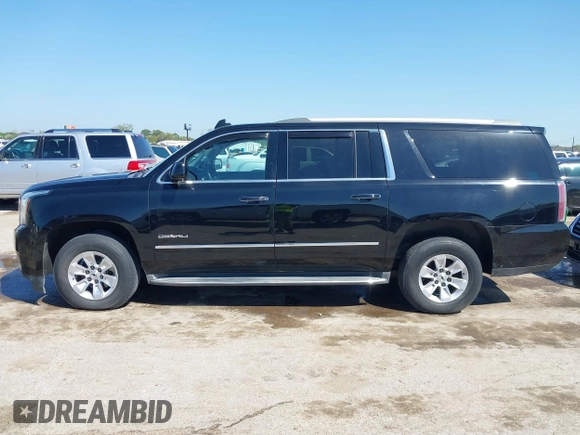 2016 GMC Yukon XL Denali with VIN 1GKS2HKJ2GR111246, listed as a IAAI auction lot 41834364 with 73,418 mi miles. Bid and sale history available at carsss.com. Image 14.