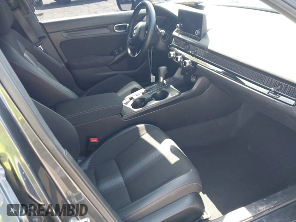 2024 Honda Civic Sport with VIN 2HGFE2F57RH559288, listed as a IAAI auction lot 42206774 with 23,674 mi miles and . Bid and sale history available at DreamBid. Image 5.