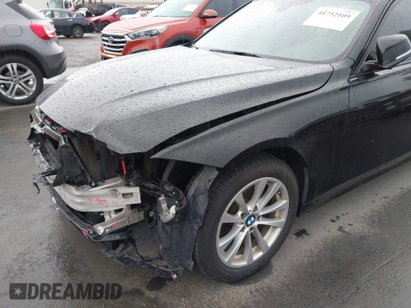 2016 BMW 3 Series 320i with VIN WBA8E1G52GNT36934, listed as a IAAI auction lot 41752109 with 100,178 mi miles and . Bid and sale history available at carsss.com. Image 18.