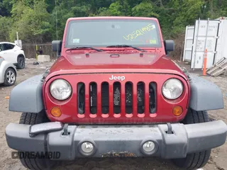 2013 Jeep Wrangler Unlimited Sport with VIN 1C4HJWDG7DL516077, listed as a IAAI auction lot 42521985 with 169,299 mi miles and . Bid and sale history available at DreamBid. Image 12.