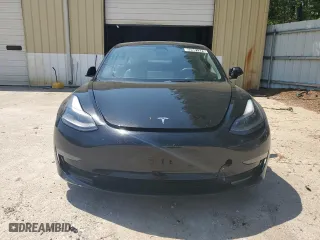 2023 Tesla Model 3 with VIN 5YJ3E1EA2PF438438, listed as a Copart auction lot 52901375 with 63,181 mi miles and Salvage Title. Bid and sale history available at carsss.com. Image 5.