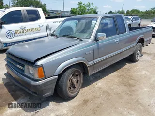 1992 Mazda B-Series Truck with VIN JM2UF313XN0306779, listed as a IAAI auction lot 42104583 with 137,826 mi miles and . Bid and sale history available at DreamBid. Image 2.