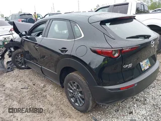 2023 Mazda CX-30 S with VIN 3MVDMBAM7PM561904, listed as a IAAI auction lot 42181907 with 15,900 mi miles and . Bid and sale history available at DreamBid. Image 3.