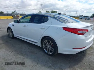 2013 Kia Optima SX with VIN 5XXGR4A65DG194141, listed as a IAAI auction lot 42261444 with 167,918 mi miles and . Bid and sale history available at DreamBid. Image 3.