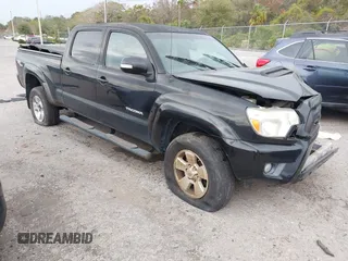 2013 Toyota Tacoma with VIN 3TMMU4FN5DM052257, listed as a IAAI auction lot 41260265 with 121,882 mi miles. Bid and sale history available at carsss.com. Image 1.