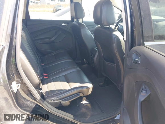 2016 Ford Escape Titanium with VIN 1FMCU0JX8GUC06601, listed as a IAAI auction lot 41785774 with 121,427 mi miles. Bid and sale history available at carsss.com. Image 8.