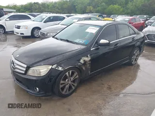 2009 Mercedes-Benz C-Class 3.5L Sport with VIN WDDGF56X19R043159, listed as a IAAI auction lot 41910010 with 173,817 mi miles. Bid and sale history available at carsss.com. Image 2.