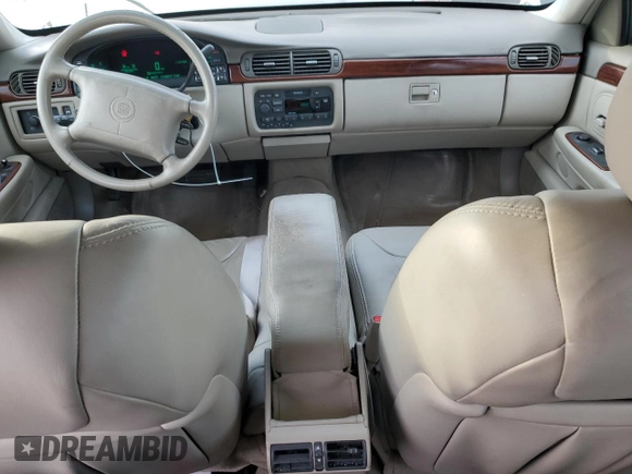 1999 Cadillac DeVille z VIN 1G6KD54Y8XU790082, wystawiony jako Copart lot #87709165 z przebiegiem 112 485 mil mil oraz Czysty tytuł • Clean title. Historia ofert i sprzedaży dostępna na DreamBid. Obrazek 8.