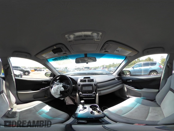 2014 Toyota Camry L with VIN 4T4BF1FKXER402857, listed as a IAAI auction lot 42144757 with 192,081 mi miles and . Bid and sale history available at DreamBid. Image 17.