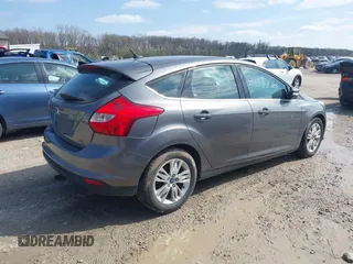 2012 Ford Focus SEL with VIN 1FAHP3M23CL460208, listed as a IAAI auction lot 41893224 with 146,553 mi miles. Bid and sale history available at carsss.com. Image 4.