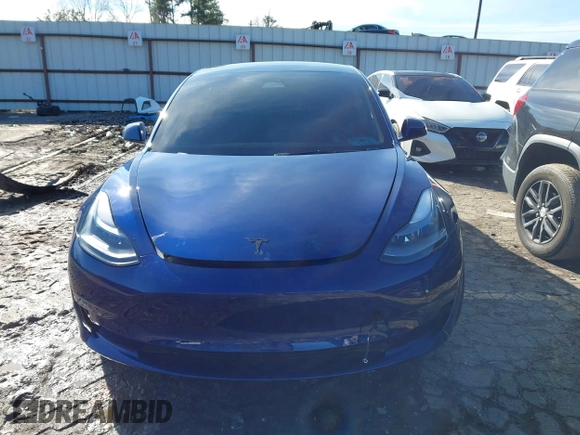 2023 Tesla Model 3 Long Range with VIN 5YJ3E1EB0PF688172, listed as a IAAI auction lot 41411580 with 21,125 mi miles and . Bid and sale history available at DreamBid. Image 12.