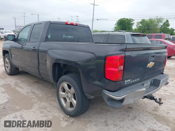 2014 Chevrolet Silverado 1500 LT with VIN 1GCRCREH5EZ371465, listed as a IAAI auction lot 42185657 with 112,151 mi miles and . Bid and sale history available at DreamBid. Image 3.