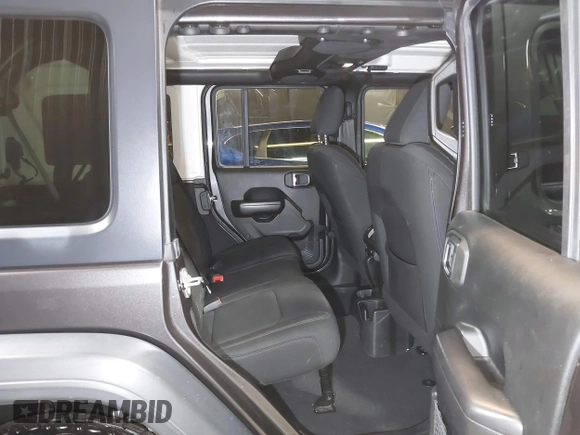 2018 Jeep Wrangler Unlimited Sport S with VIN 1C4HJXDG5JW126496, listed as a IAAI auction lot 42390584 with 163,476 mi miles and . Bid and sale history available at DreamBid. Image 8.