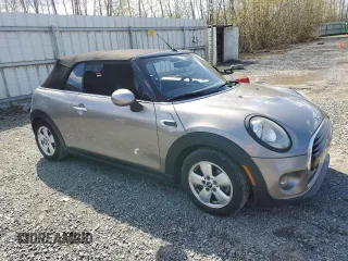 2016 MINI Convertible z VIN WMWWG5C53G3C18887, wystawiony jako Copart lot #51874965 z przebiegiem 78 102 mil mil oraz Szkody całkowita. Historia ofert i sprzedaży dostępna na DreamBid. Obrazek 4.