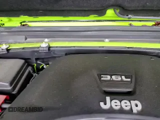 2021 Jeep Wrangler Sport S with VIN 1C4HJXAG2MW817025, listed as a Copart auction lot 61175485 with 55,387 mi miles and Salvage title. Bid and sale history available at DreamBid. Image 13.