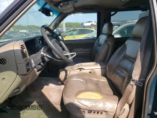 1998 GMC Yukon with VIN 1GKEK13RXWJ723572, listed as a Copart auction lot 65987314 with 237,503 mi miles and Salvage Title. Bid and sale history available at carsss.com. Image 7.