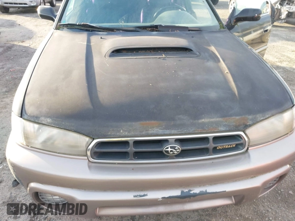 1999 Subaru Legacy Outback z VIN 4S3BG6856X7603852, wystawiony jako IAAI lot #41299373 z przebiegiem 168 991 mil mil oraz . Historia ofert i sprzedaży dostępna na DreamBid. Obrazek 6.