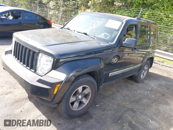 2008 Jeep Liberty Sport with VIN 1J8GP28KX8W227953, listed as a IAAI auction lot 42049588 with 310,901 mi miles. Bid and sale history available at carsss.com. Image 2.