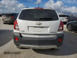 2014 Chevrolet Captiva Sport LS with VIN 3GNAL2EK6ES630176, listed as a Copart auction lot 73801784 with 99,567 mi miles and Salvage Title. Bid and sale history available at DreamBid. Image 6.