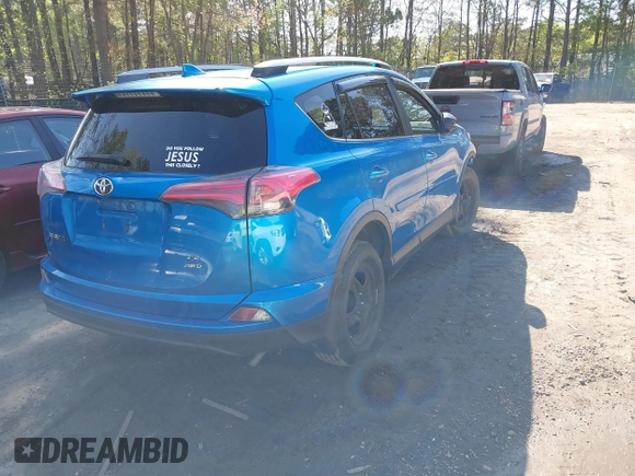 2018 Toyota RAV4 LE with VIN JTMBFREV3JJ253566, listed as a IAAI auction lot 41978107 with 49,729 mi miles. Bid and sale history available at carsss.com. Image 4.