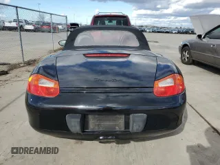 2000 Porsche Boxster z VIN WP0CA2988YU627807, wystawiony jako Copart lot #45522955 z przebiegiem 120 384 mil mil oraz Szkody całkowita. Historia ofert i sprzedaży dostępna na DreamBid. Obrazek 6.