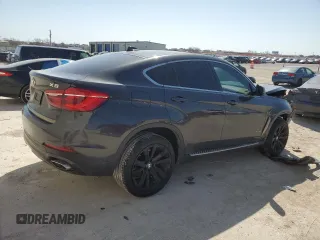 2018 BMW X6 xDrive35i with VIN 5UXKU2C51J0X49700, listed as a Copart auction lot 48802985 with 95,733 mi miles and Salvage Title. Bid and sale history available at carsss.com. Image 3.