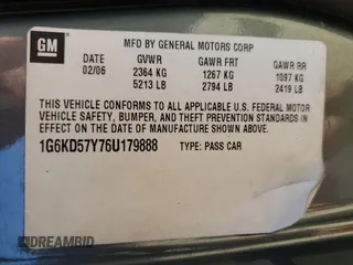 2006 Cadillac DTS 1SD z VIN 1G6KD57Y76U179888, wystawiony jako Copart lot #47218125 z przebiegiem 181 683 mil mil oraz Szkoda całkowita • Salvage title. Historia ofert i sprzedaży dostępna na DreamBid. Obrazek 12.