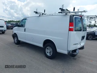 2023 Chevrolet Express Cargo with VIN 1GCWGAFP5P1217550, listed as a IAAI auction lot 42383684 with 9,673 mi miles and . Bid and sale history available at DreamBid. Image 3.
