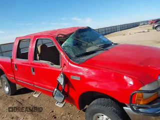 1999 Ford Super Duty F-250 XL with VIN 1FTNW21F7XEA71082, listed as a IAAI auction lot 41665200 with 210,841 mi miles. Bid and sale history available at carsss.com. Image 6.