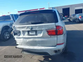 2012 BMW X5 35d with VIN 5UXZW0C56CL665631, listed as a IAAI auction lot 41055705 with 179,408 mi miles and . Bid and sale history available at DreamBid. Image 16.