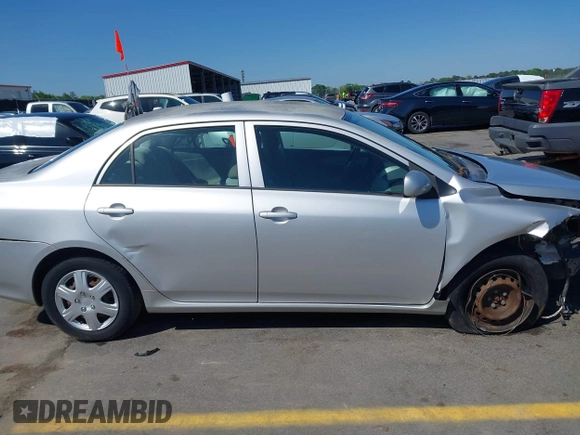 2009 Toyota Corolla with VIN 1NXBU40E99Z100681, listed as a IAAI auction lot 41973116 with 119,744 mi miles. Bid and sale history available at carsss.com. Image 13.