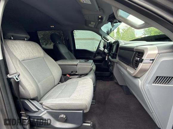 2021 Ford F-150 XL with VIN 1FTFW1E86MKD57397, listed as a Copart auction lot 62959355 with 59,227 mi miles and Salvage title. Bid and sale history available at DreamBid. Image 5.