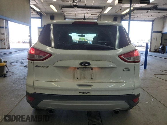 2016 Ford Escape SE с VIN 1FMCU9GX8GUA99979, выставлен на аукционе Copart как лот 57623295 с пробегом 124 813 миль миль и Списание • Salvage title. История ставок и продаж доступна на DreamBid. Изображение 6.