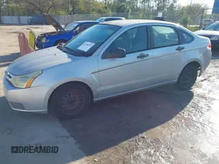 2009 Ford Focus S with VIN 1FAHP34N79W221813, listed as a IAAI auction lot 41758471 with 248,531 mi miles. Bid and sale history available at carsss.com. Image 17.