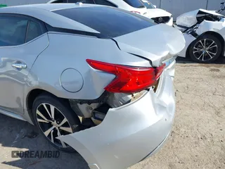 2017 Nissan Maxima SV with VIN 1N4AA6AP3HC449432, listed as a IAAI auction lot 40914078 with 118,020 mi miles and . Bid and sale history available at DreamBid. Image 6.