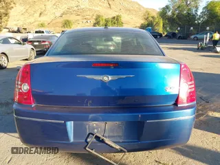 2009 Chrysler 300 Touring with VIN 2C3LA53V89H565270, listed as a IAAI auction lot 41069505 with 112,830 mi miles. Bid and sale history available at carsss.com. Image 16.