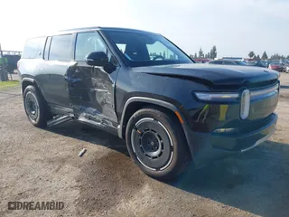 2025 Rivian R1S Adventure with VIN 7PDSGBBAXSN055849, listed as a IAAI auction lot 41255282 with 2,885 mi miles. Bid and sale history available at carsss.com. Image 1.
