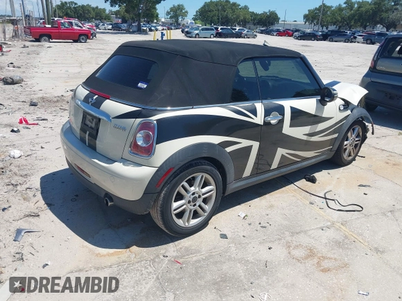 2015 MINI Convertible with VIN WMWZN3C53FT861968, listed as a IAAI auction lot 42717485 with 79,840 mi miles and . Bid and sale history available at DreamBid. Image 4.