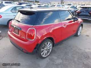 2024 MINI Hardtop 2 Door Cooper SE with VIN WMW13DJ07R2U39440, listed as a IAAI auction lot 41275780 with 16,009 mi miles. Bid and sale history available at carsss.com. Image 4.