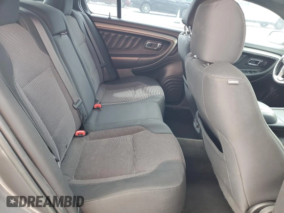 2014 Ford Taurus SEL z VIN 1FAHP2E80EG174910, wystawiony jako Copart lot #56070945 z przebiegiem 147 201 mil mil oraz Szkody całkowita. Historia ofert i sprzedaży dostępna na DreamBid. Obrazek 10.