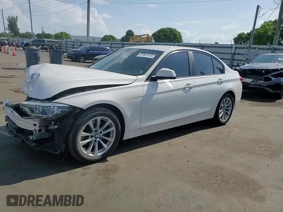 2018 BMW 3 Series 320i xDrive with VIN WBA8A3C55JA357532, listed as a Copart auction lot 57561015 with 46,876 mi miles and Salvage title. Bid and sale history available at DreamBid. Image 13.