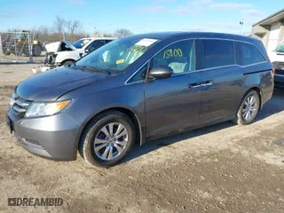 2016 Honda Odyssey EX-L with VIN 5FNRL5H67GB147335, listed as a IAAI auction lot 41115400 with 165,656 mi miles. Bid and sale history available at carsss.com. Image 2.