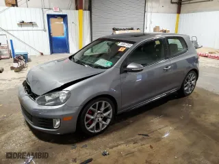 2013 Volkswagen GTI with VIN WVWFV7AJ8DW012833, listed as a Copart auction lot 46667255 with 106,973 mi miles and Salvage Title. Bid and sale history available at carsss.com. Image 1.