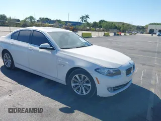 2016 BMW 5 Series 528i xDrive with VIN WBA5A7C51GG151902, listed as a IAAI auction lot 41753653 with 126,398 mi miles. Bid and sale history available at carsss.com. Image 1.
