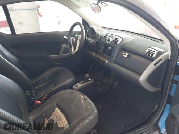 2008 Smart fortwo Pure with VIN WMEEJ31X28K123879, listed as a IAAI auction lot 42258663 with 93,056 mi miles and . Bid and sale history available at DreamBid. Image 5.