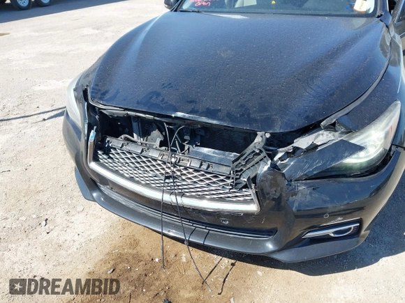 2014 Infiniti Q50 Premium z VIN JN1BV7AP2EM672661, wystawiony jako IAAI lot #42319325 z przebiegiem 85 803 mil mil oraz . Historia ofert i sprzedaży dostępna na DreamBid. Obrazek 6.
