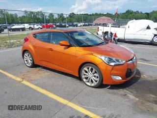 2013 Hyundai Veloster w/Gray Int with VIN KMHTC6AD8DU161702, listed as a IAAI auction lot 42241955 with 33,400 mi miles and . Bid and sale history available at DreamBid. Image 1.