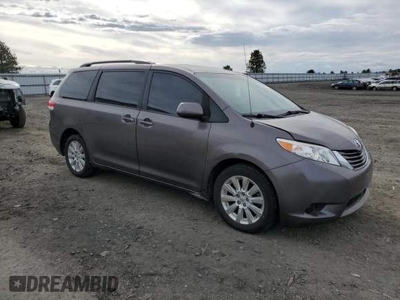 2014 Toyota Sienna LE with VIN 5TDJK3DC7ES073648, listed as a Copart auction lot 50554095 with 136,236 mi miles and Salvage Title. Bid and sale history available at DreamBid. Image 4.