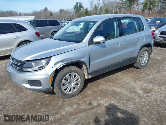 2012 Volkswagen Tiguan with VIN WVGCV7AX6CW589605, listed as a IAAI auction lot 41916090 with 123,223 mi miles and . Bid and sale history available at DreamBid. Image 2.